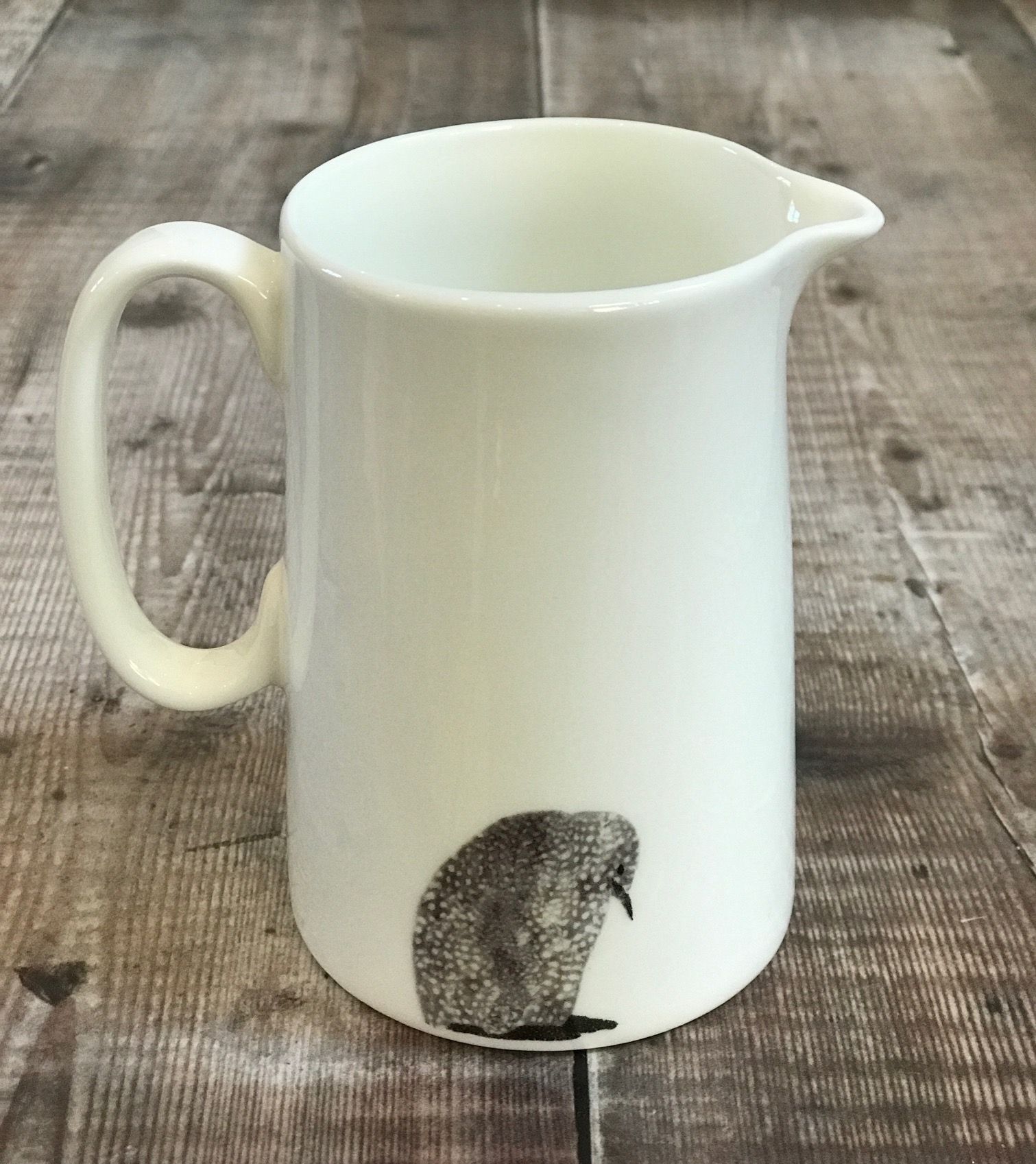 jug size 2 half pint penguin back