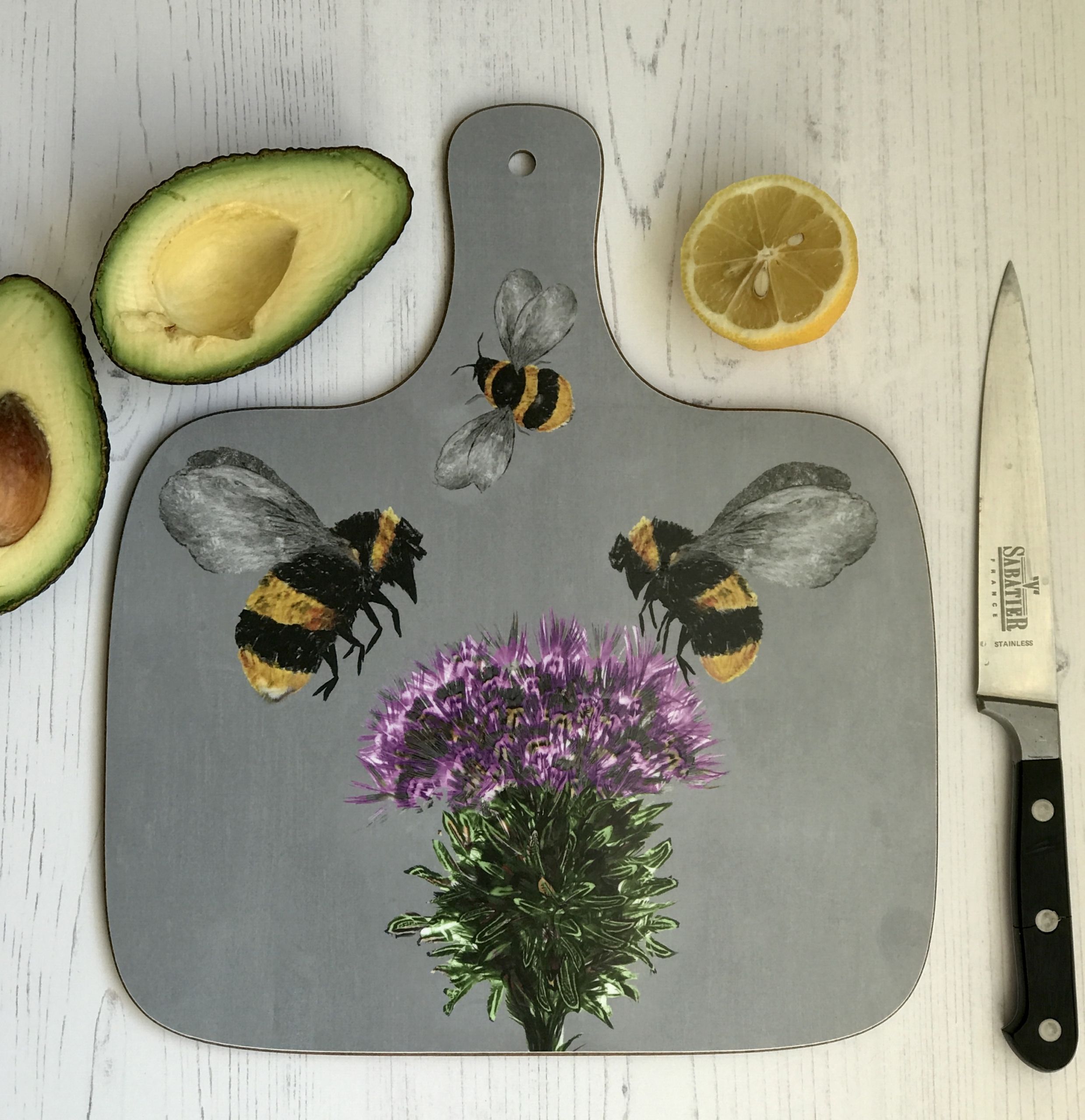 chopping board medium bees and thistles on grey