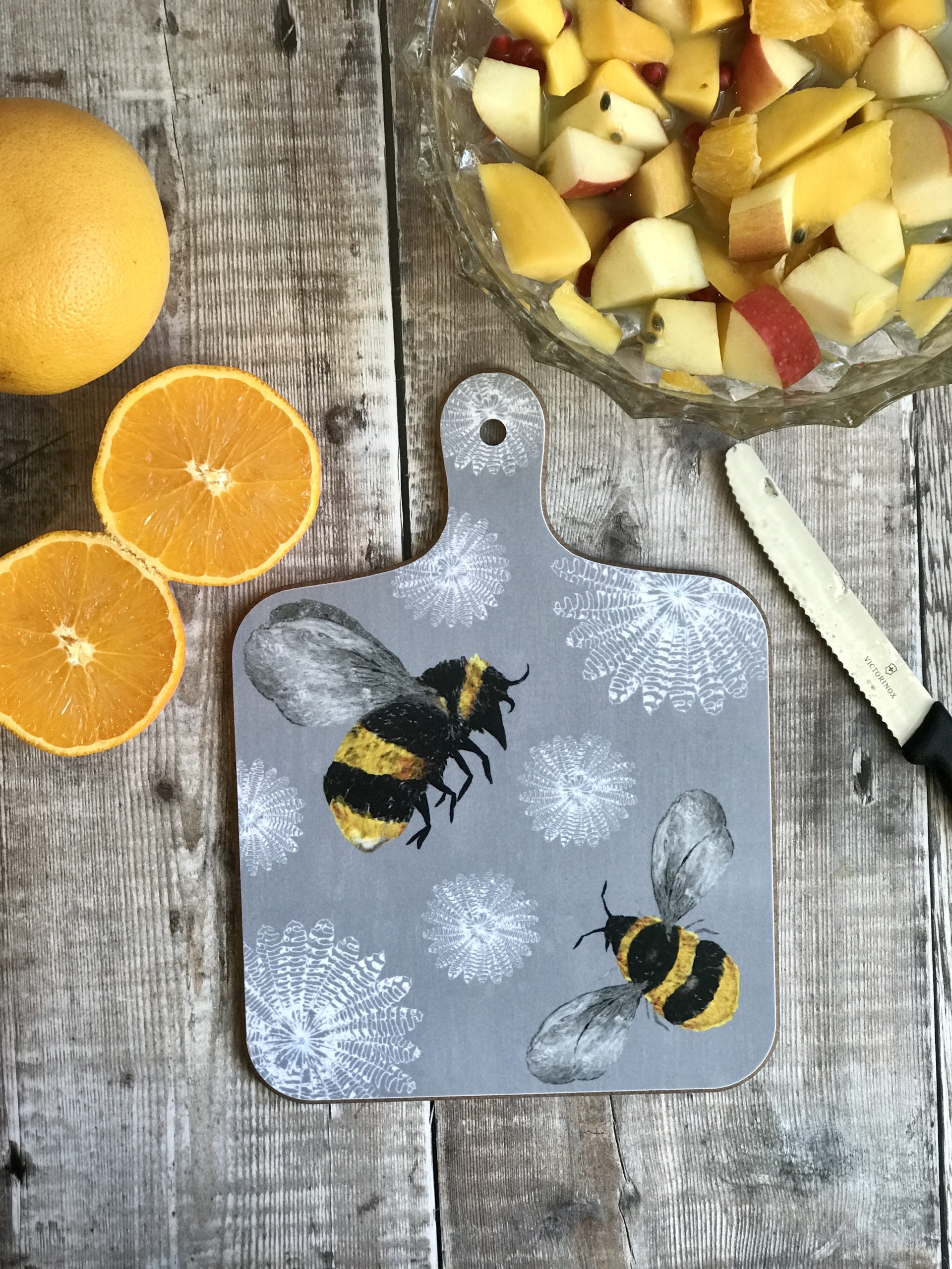 chopping board small bees and flowers portrait