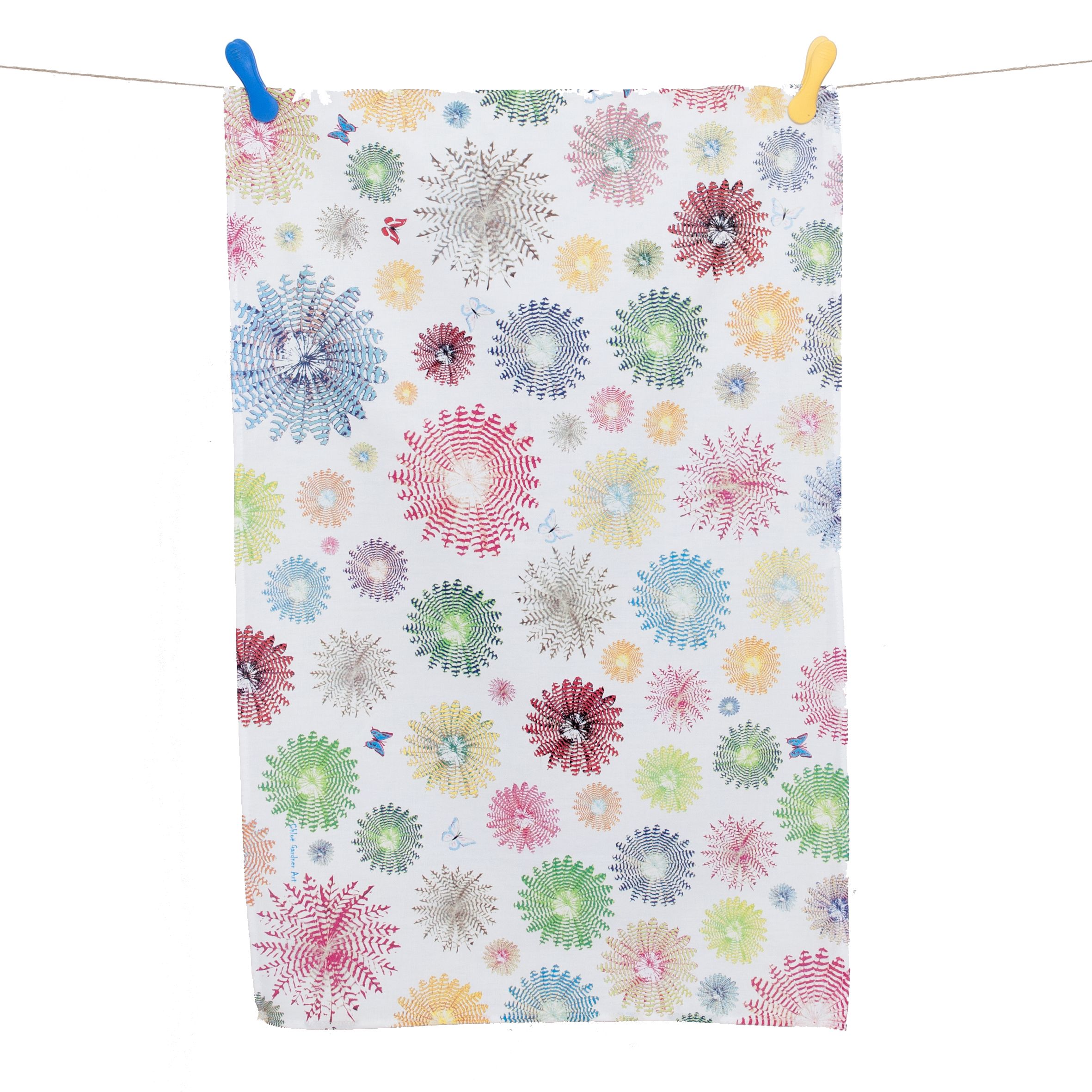 tea towel hanging on white feather rounds B