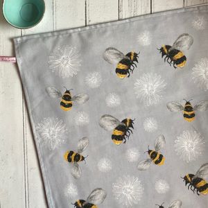 TEA TOWEL IN A GIFT BAG -  BEES & FEATHER FLOWERS ON GREY