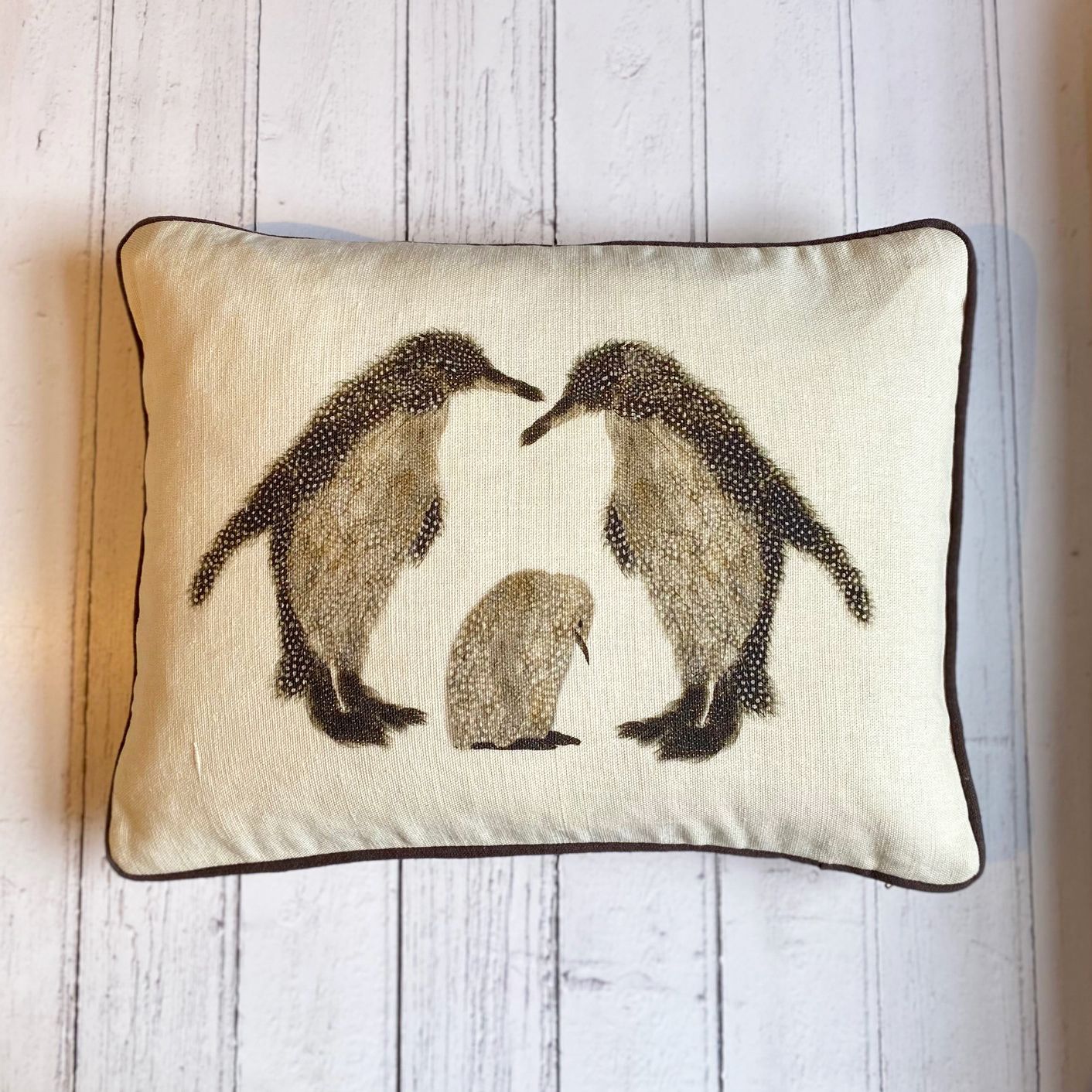 cushion two penguins and a baby on white wood B
