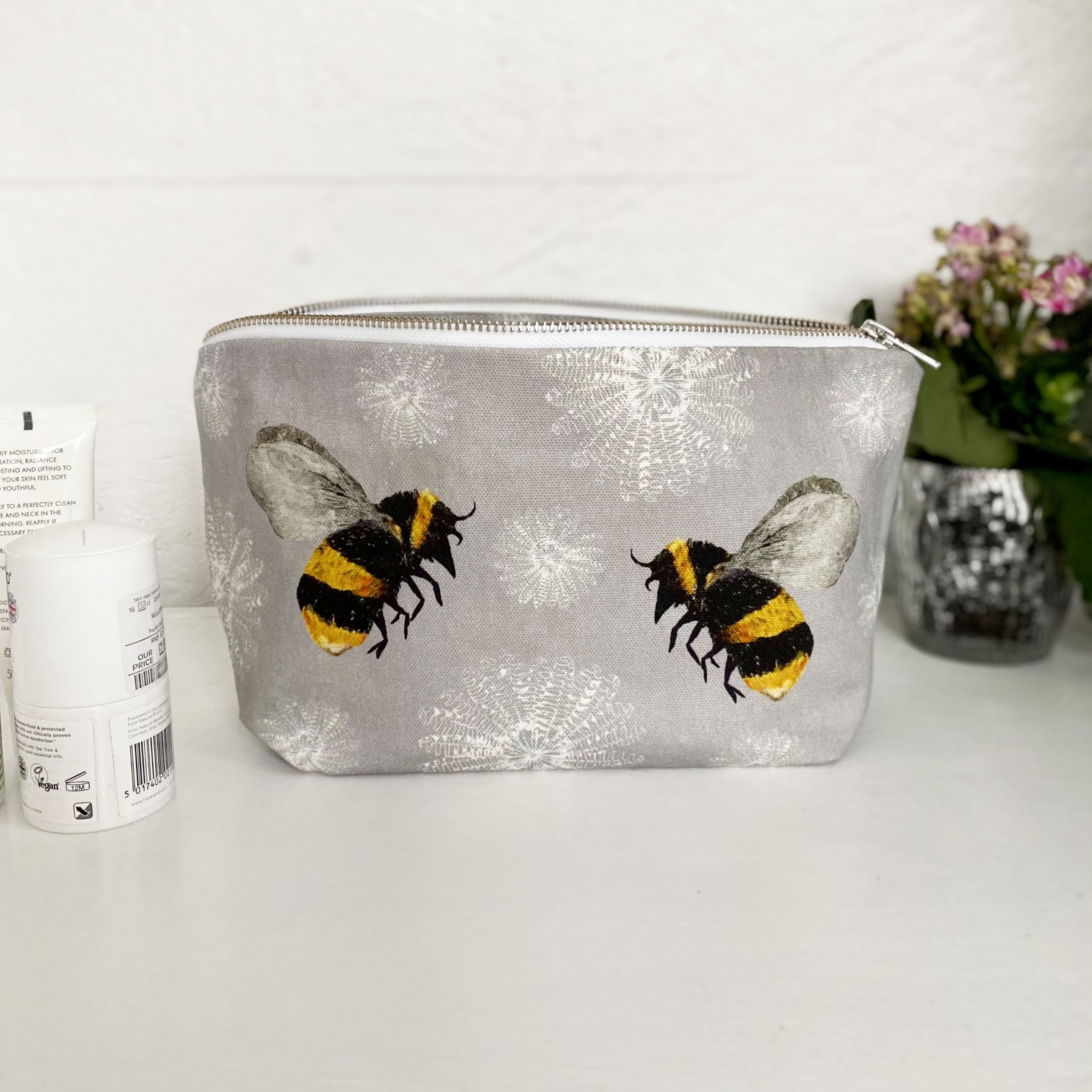 Washbag 1 - Bee and white feather flower design with a simple white inside