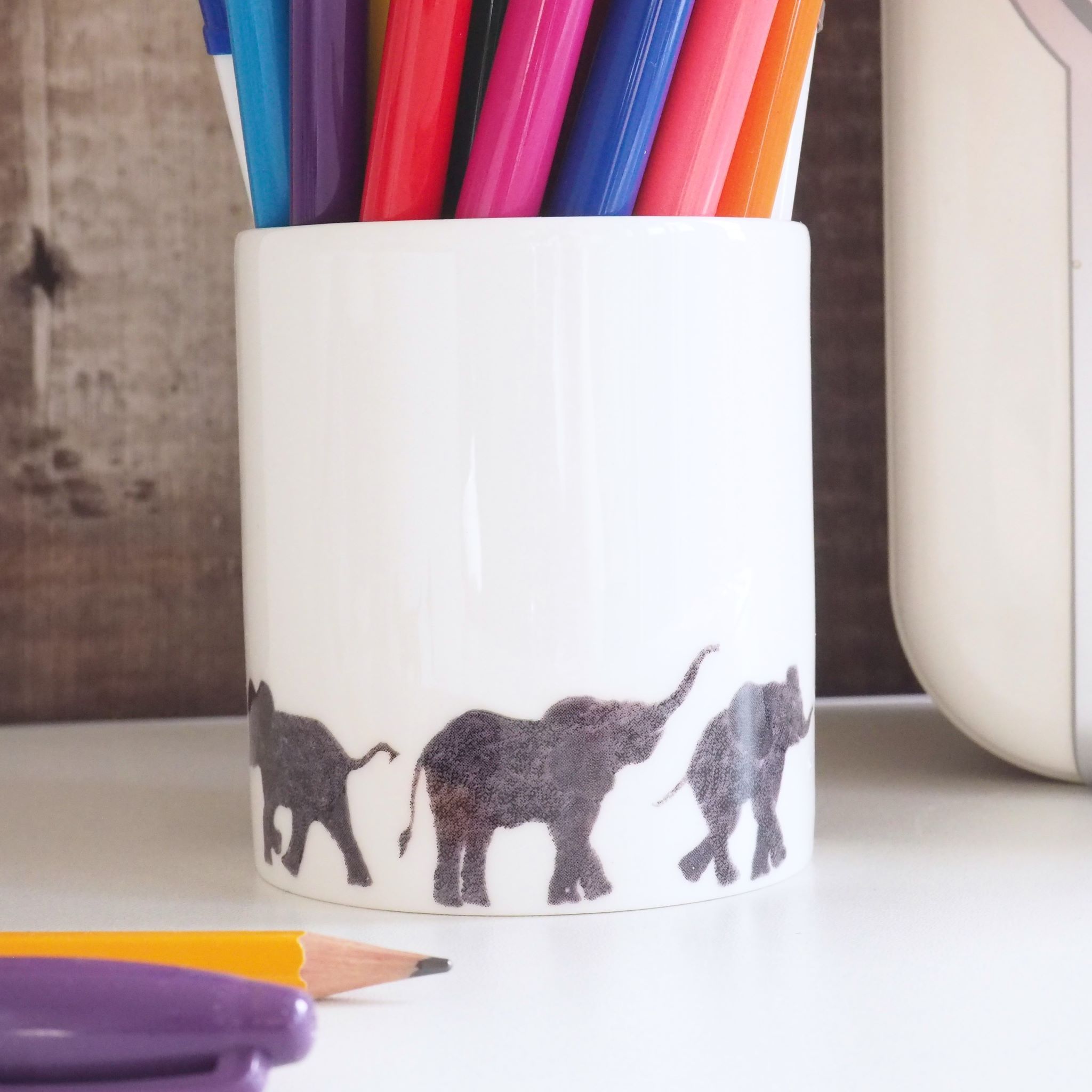 Elephant Row Pot with Pens by Chloe Gardner Elephant Ceramic Pot