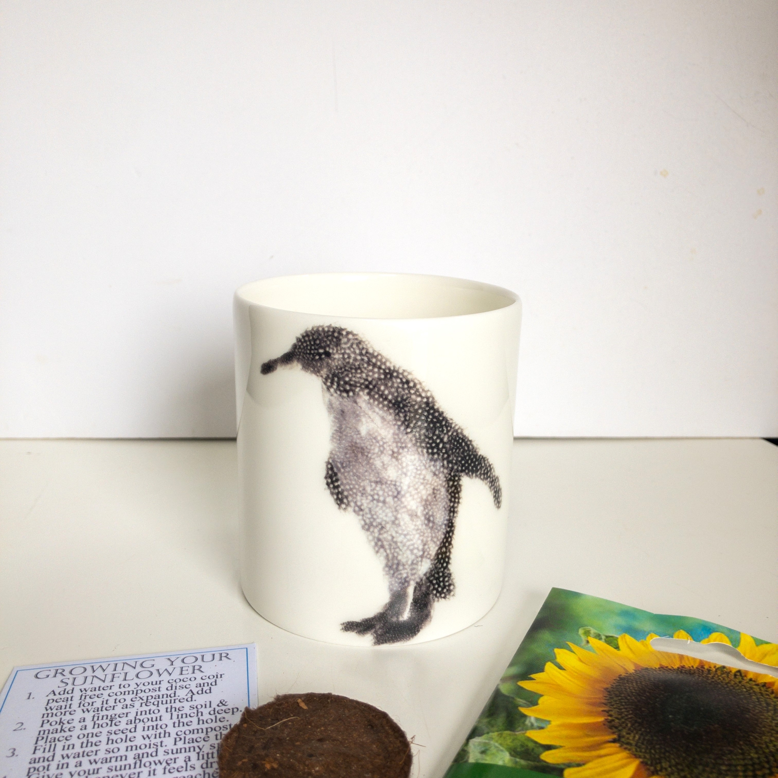 Fine Bone China Pot with Sunflower Seed Penguin and baby