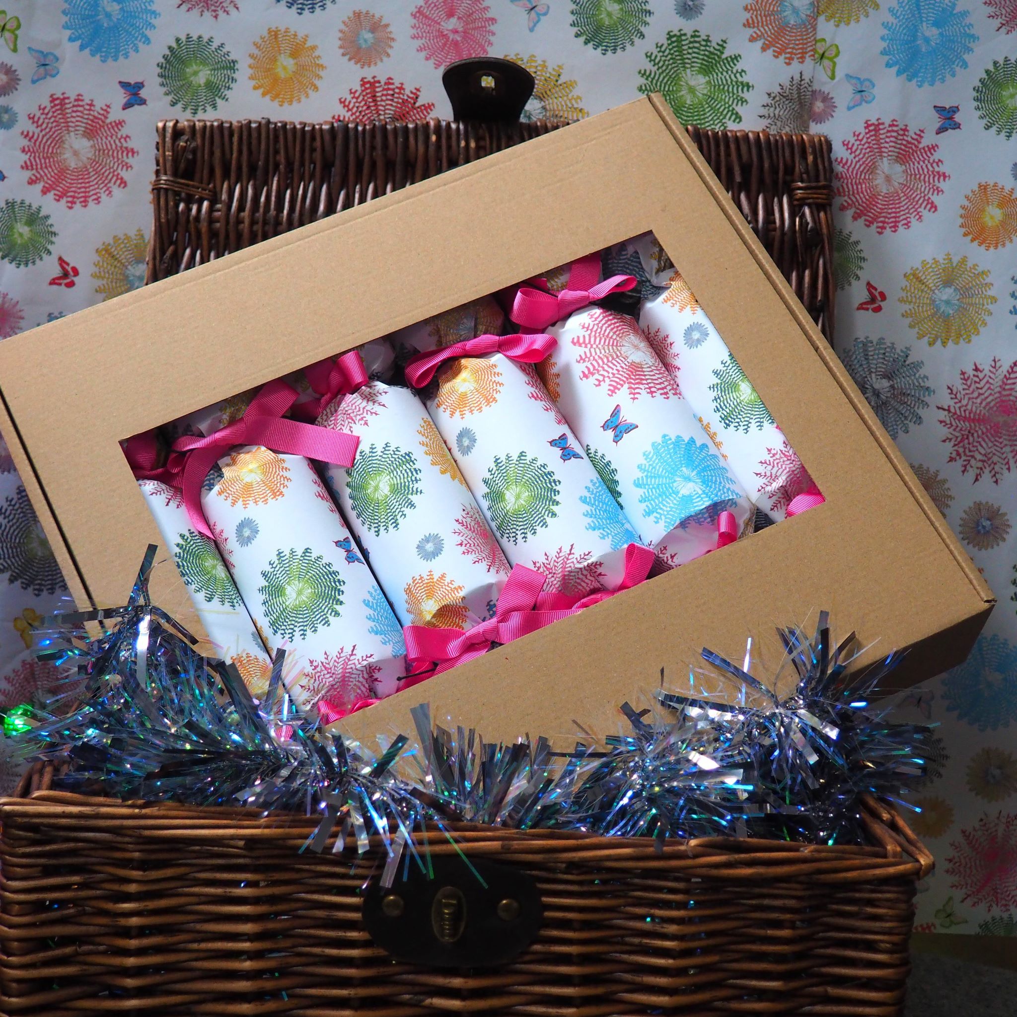 crackers Feather Rounds Pink in basket WEB under 500